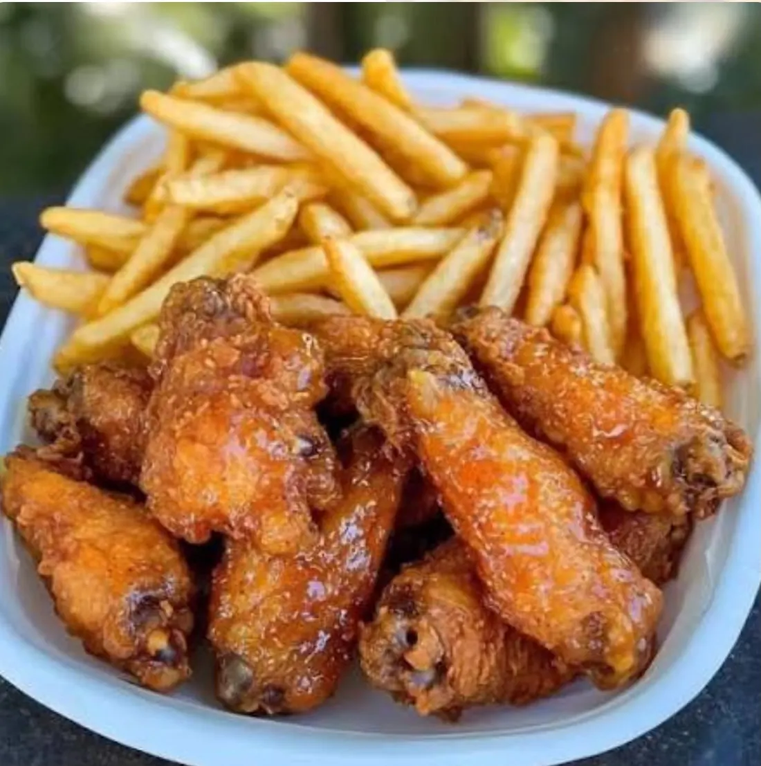 Glazed wings served with french fries